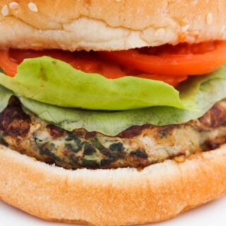 Turkey burger with lettuce and tomato on a bun