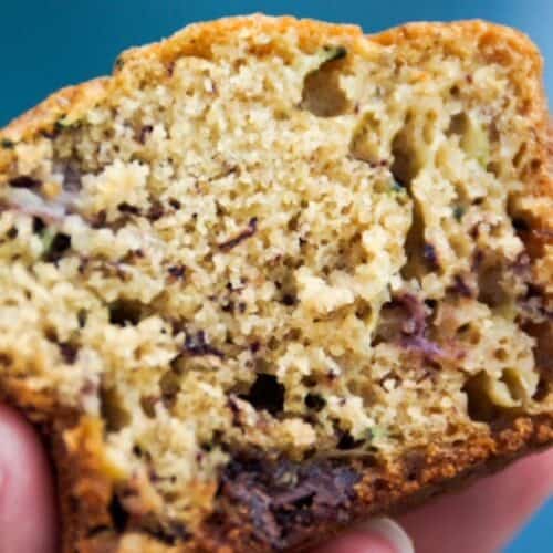 Up close picture of half of a muffin, facing the inside.