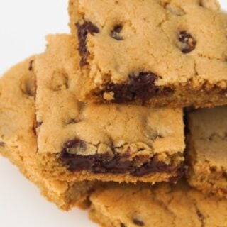 Chocolate chip cookie bars on a white plate