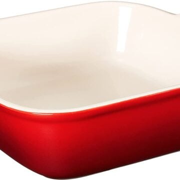 One square red ceramic coated baking dish by Le Creuset.