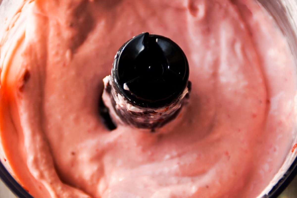 strawberry cream cheese in a food processor, top view