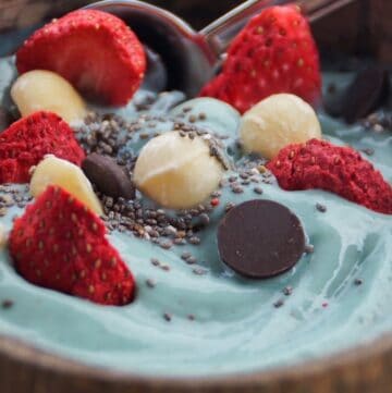 Blue smoothie bowl with toppings in a bowl