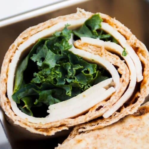 healthy chicken wrap, halved, with the inside showing
