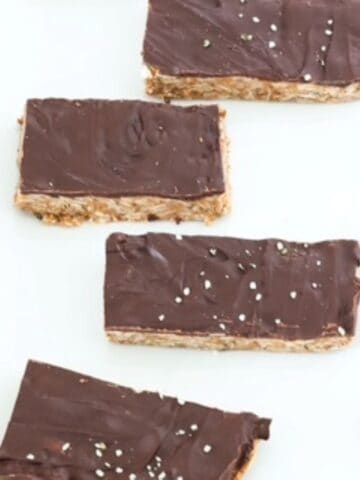 Four Peanut Butter Protein Bars on a white dish.