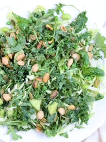 A salad on a white plate.