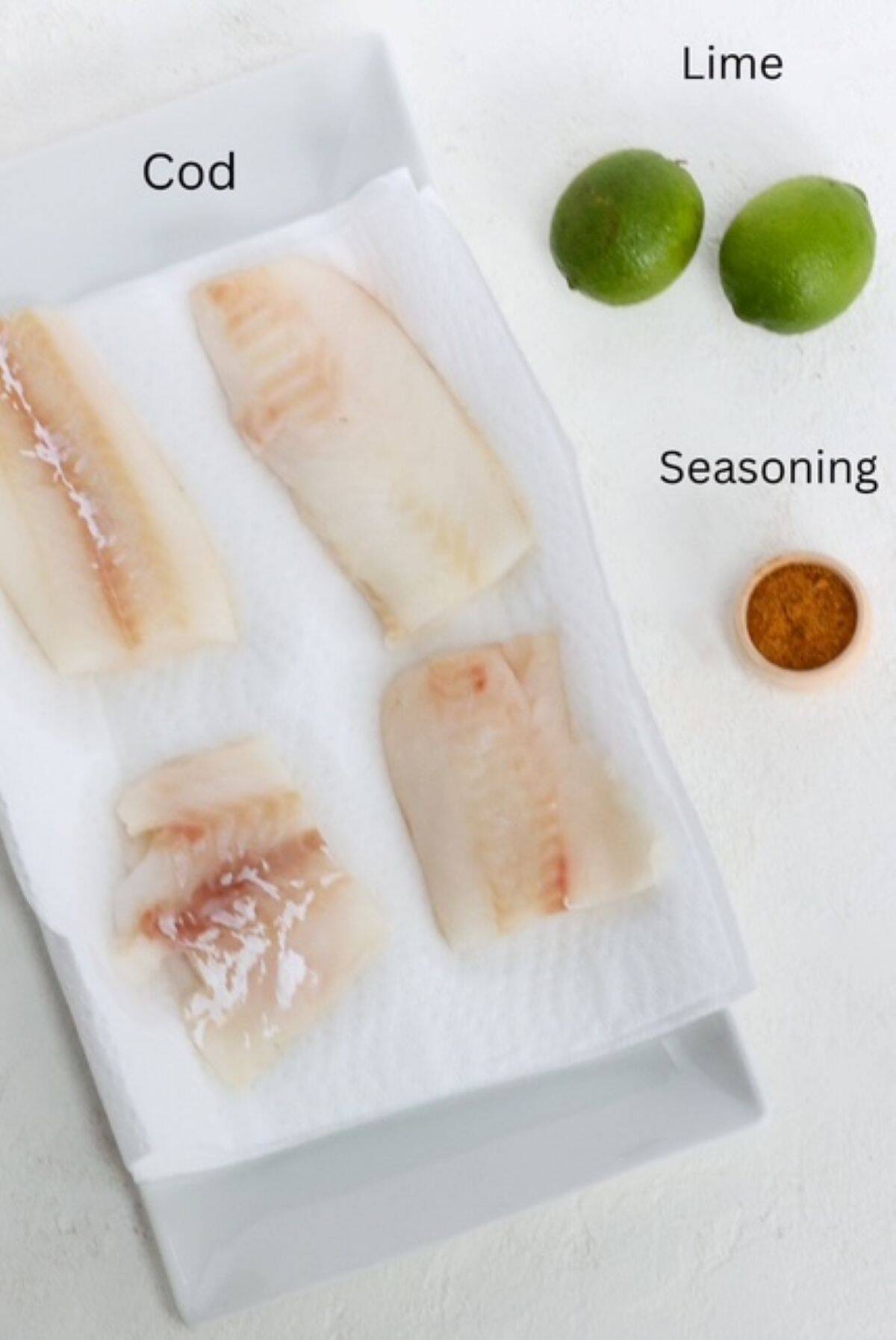 Ingredients for making air fryer cod, labeled.