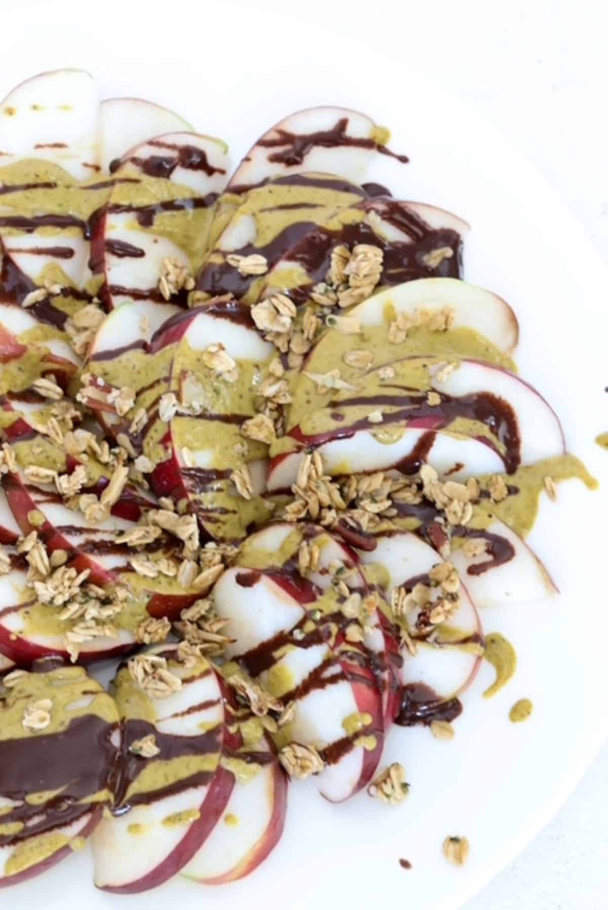 Dubai-style Apple Nachos on a white plate.